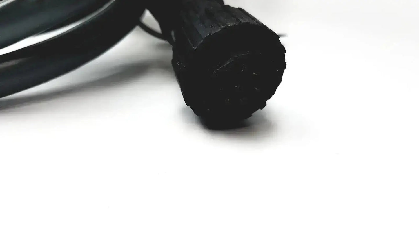 Black rubber-coated electrical cable with textured ribbed connector end for axiovert 35 inverted phase contrast microscope