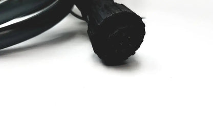 Black rubber-coated electrical cable with textured ribbed connector end for axiovert 35 inverted phase contrast microscope