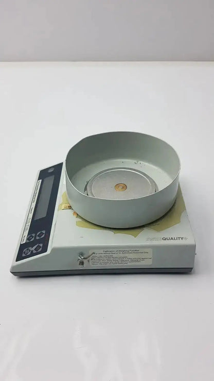 Gray metallic baker universal g-box12-33i weighing scale with circular platform and digital display for prescription weighing