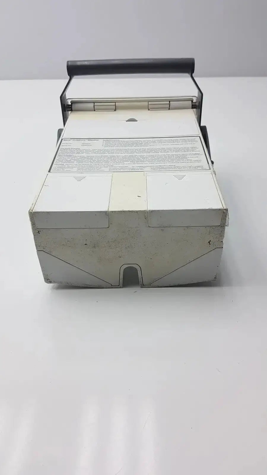 White plastic bard criticore fluid output and temperature monitor 000002n cash register with black handle and visible wear