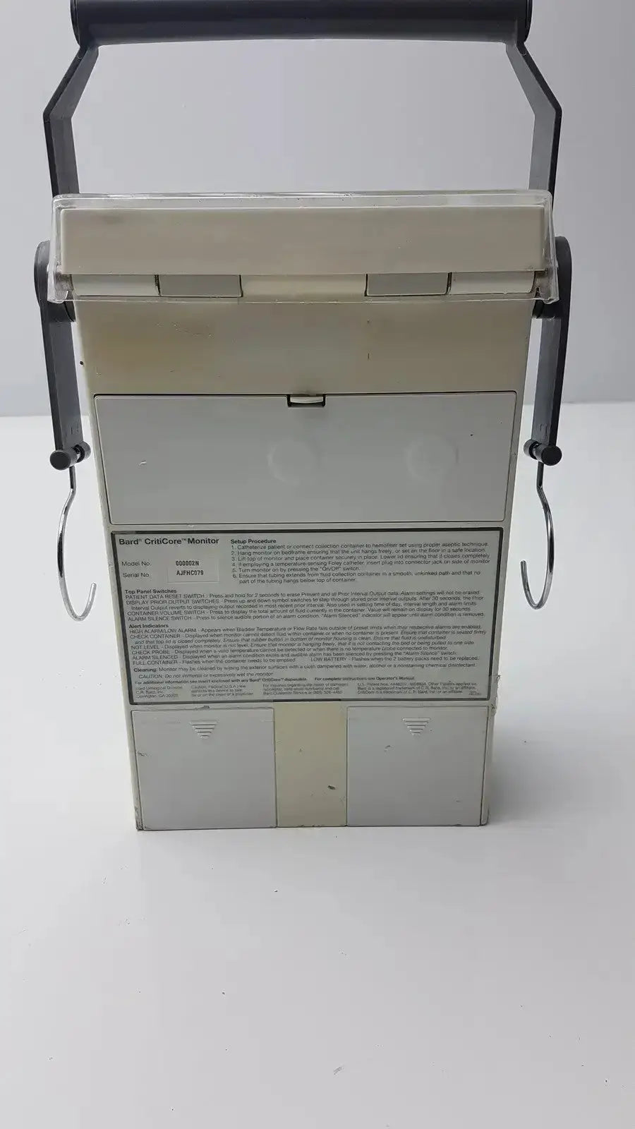 Beige plastic and metal bard criticore fluid output and temperature monitor 000002n case with black handle and side hooks
