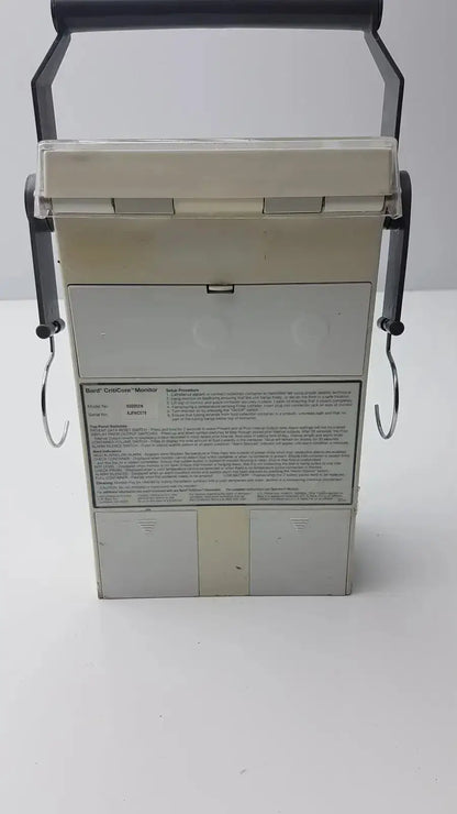 Beige plastic and metal bard criticore fluid output and temperature monitor 000002n case with black handle and side hooks