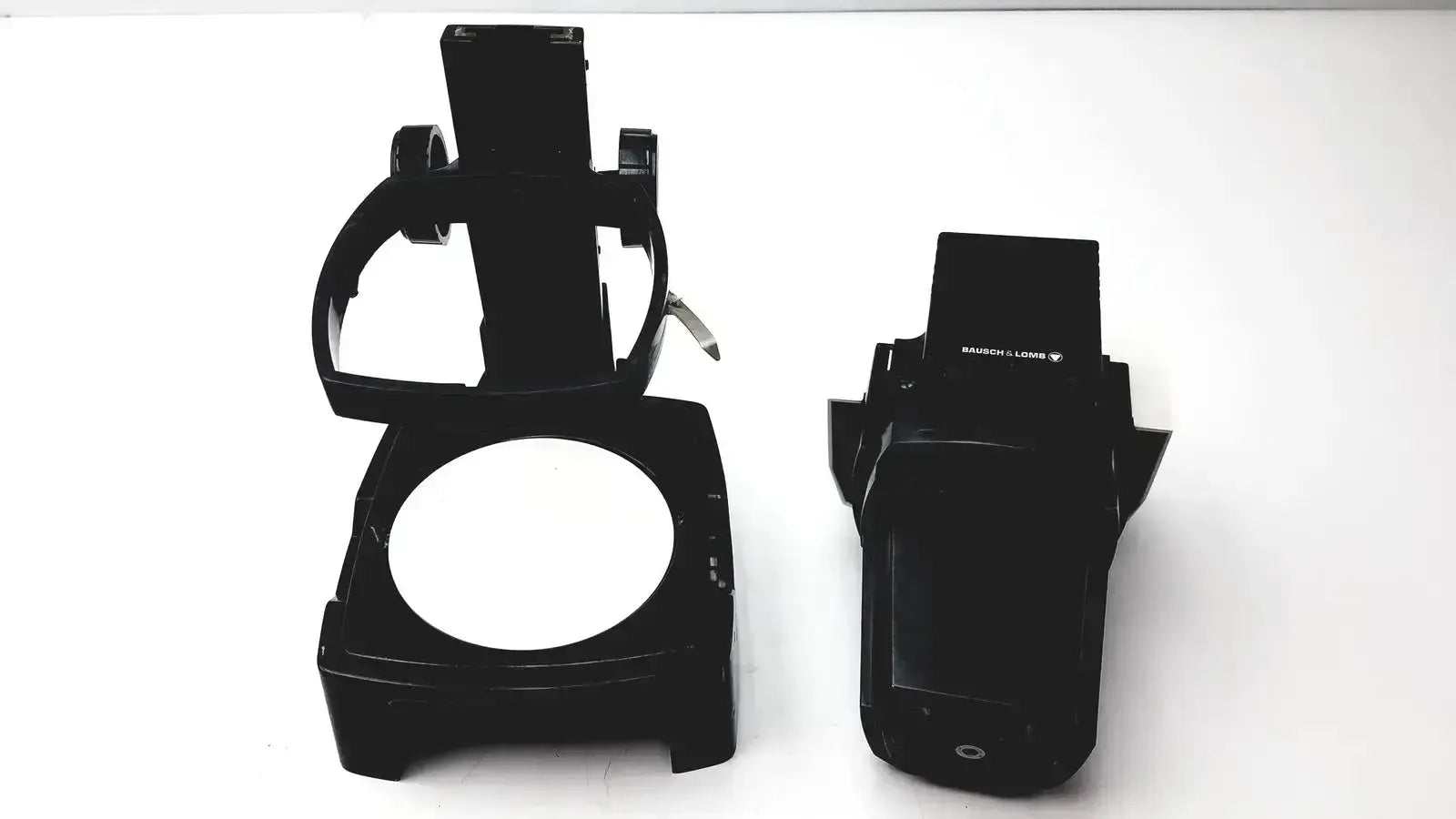 Black plastic camera mount and grip assembly for untested Bausch & Lomb microscope in hospital surplus biomedical evaluation