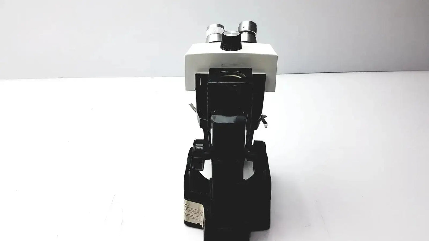 B&w compound lomb microscope with dual eyepieces and adjustable focus knobs for biomedical evaluation hospital surplus