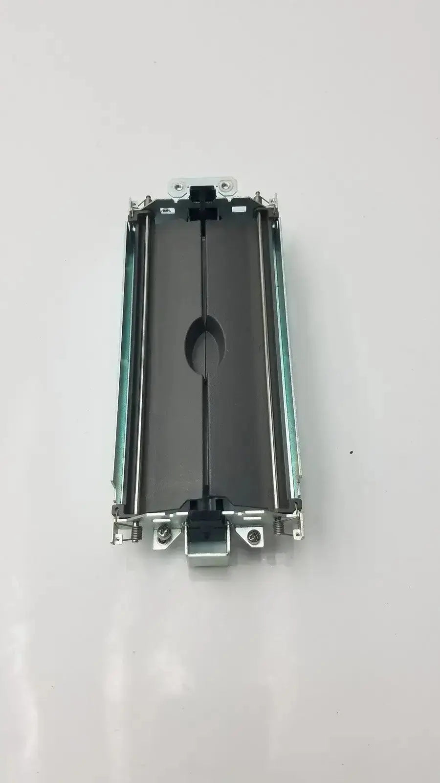 Silver metallic printer carriage with central circular slot and mechanical parts for siemens bazel & assy secondary barrier