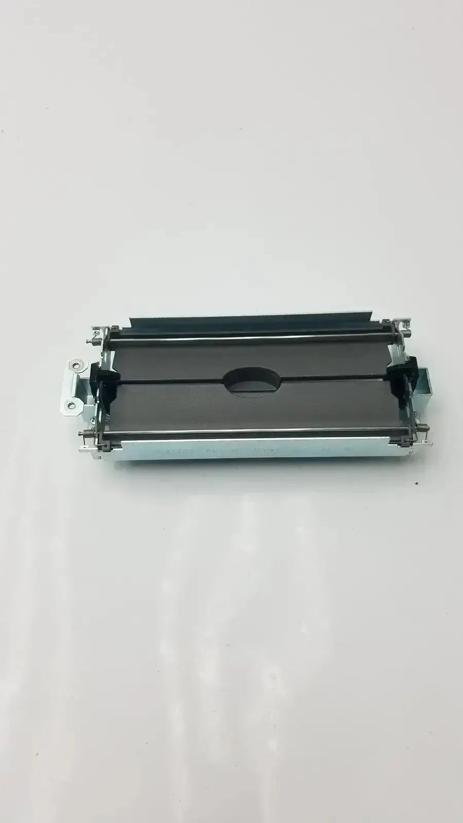 Black and silver printer toner cartridge with metallic housing and plastic components for bazel & assy secondary barrier model 18137787