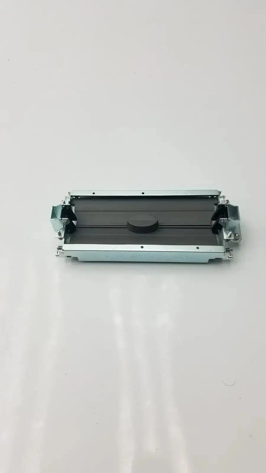 Silver metallic air conditioning evaporator coil with black rubber gasket and mounting brackets for Siemens assy secondary barrier model 18137787