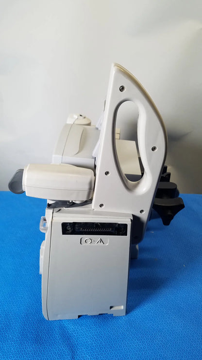 Bd alaris 8015 pc pump with 2x 8100 modules showing white plastic ironing station with curved handle and black adjustable feet for modular infusion medical equipment