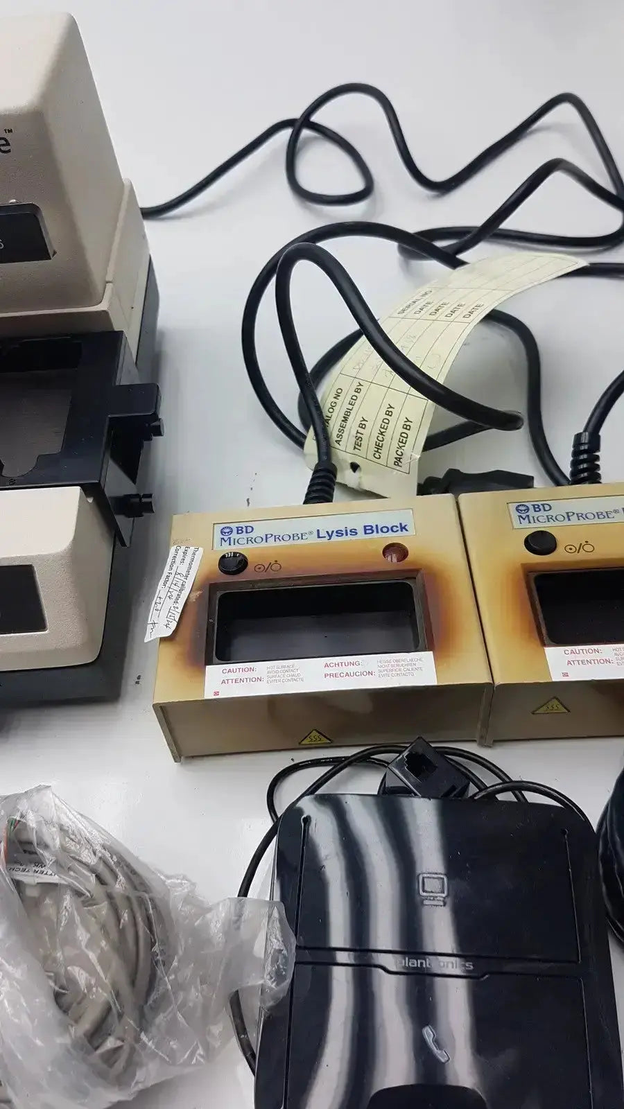 Bd microprobe processor with two beige and black lysis block units featuring labels and cables for used medical equipment sale