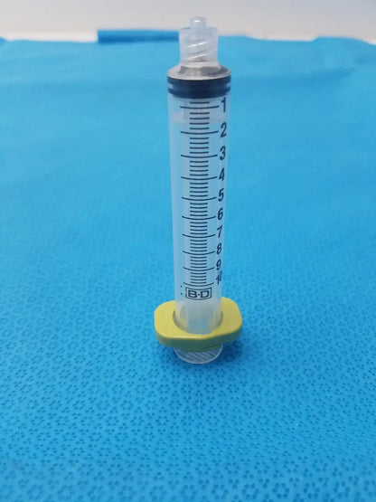 Get a 10ml medical syringe with a yellow clip, a clear barrel, and visible markings for dependable measurement and handling. Buy BD 10ml Syringe at a low price.