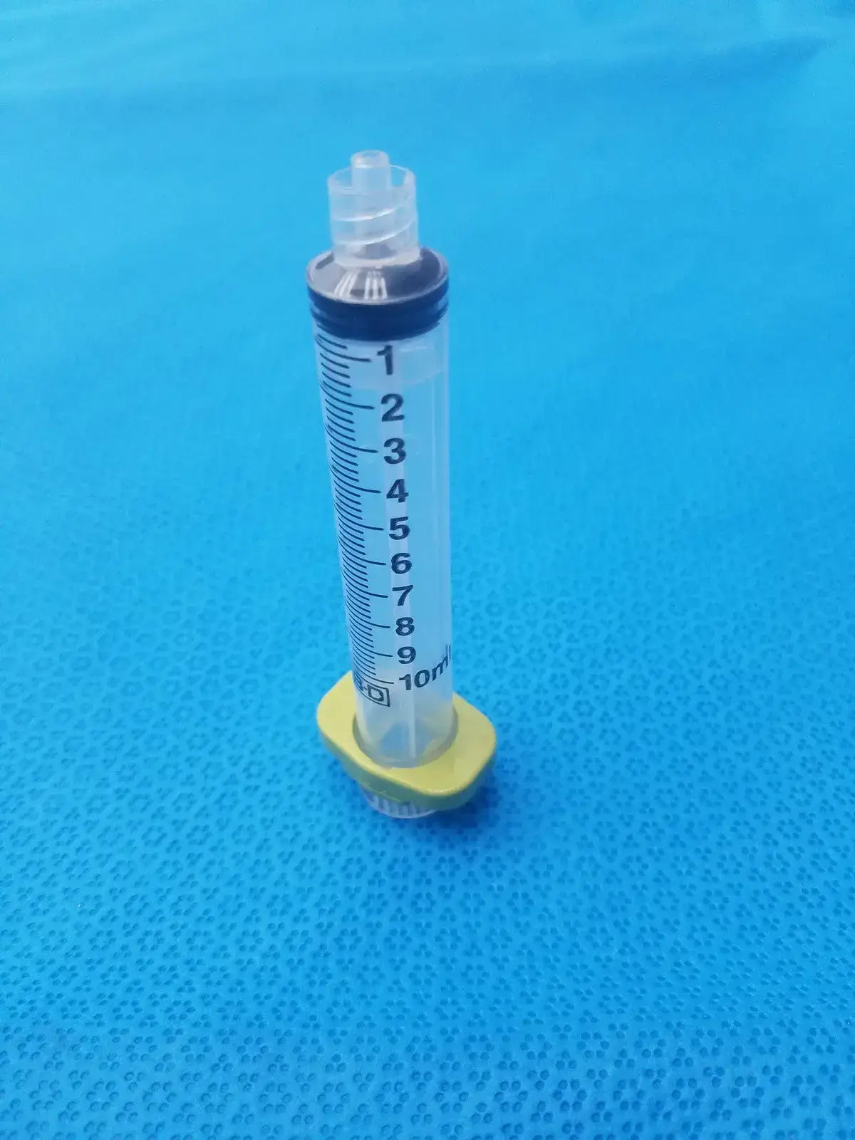 Get a 10ml medical syringe with a yellow clip, a clear barrel, and visible markings for dependable measurement and handling. Buy BD 10ml Syringe at a low price.