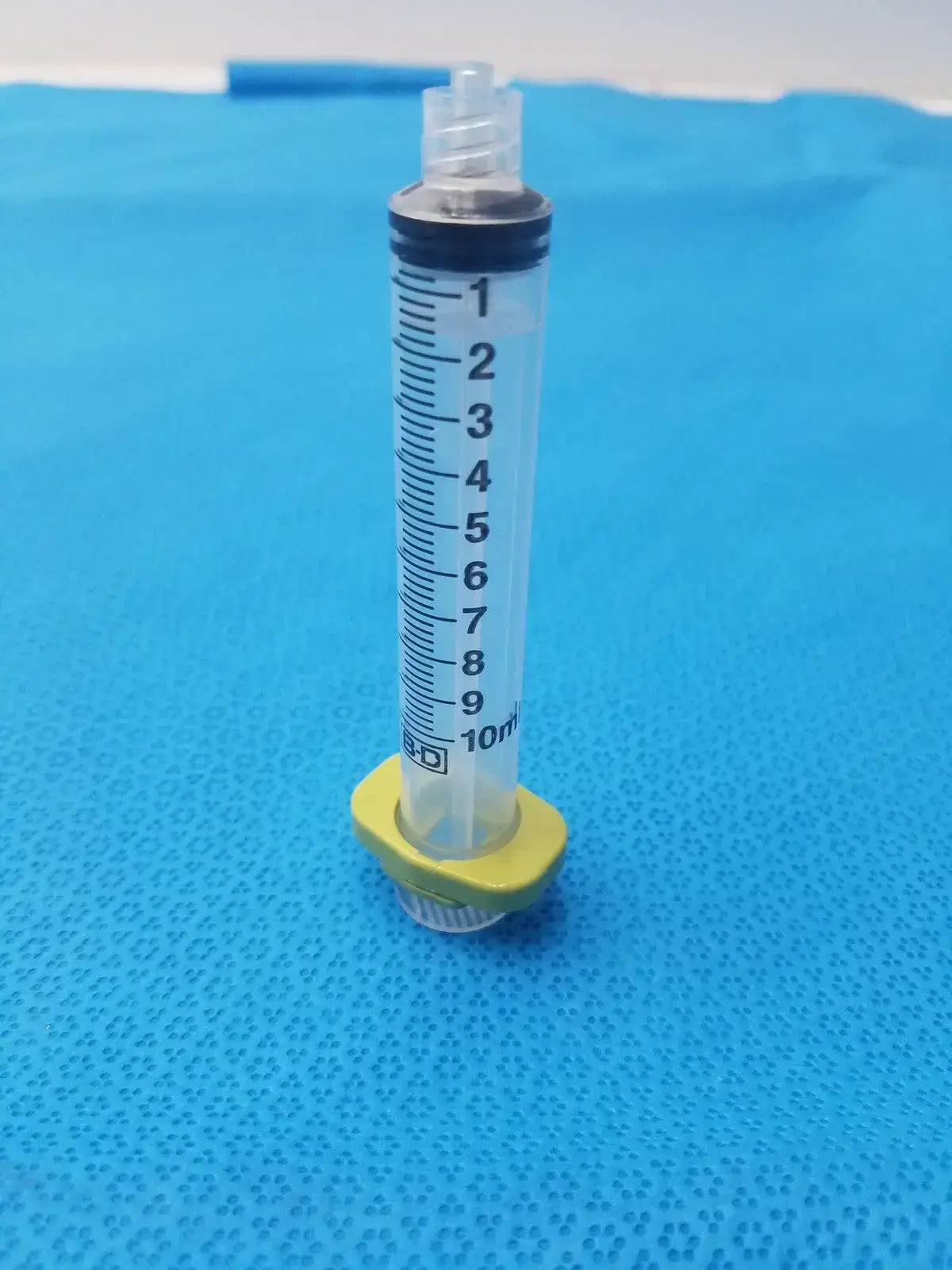 Get a 10ml medical syringe with a yellow clip, a clear barrel, and visible markings for dependable measurement and handling. Buy BD 10ml Syringe at a low price.