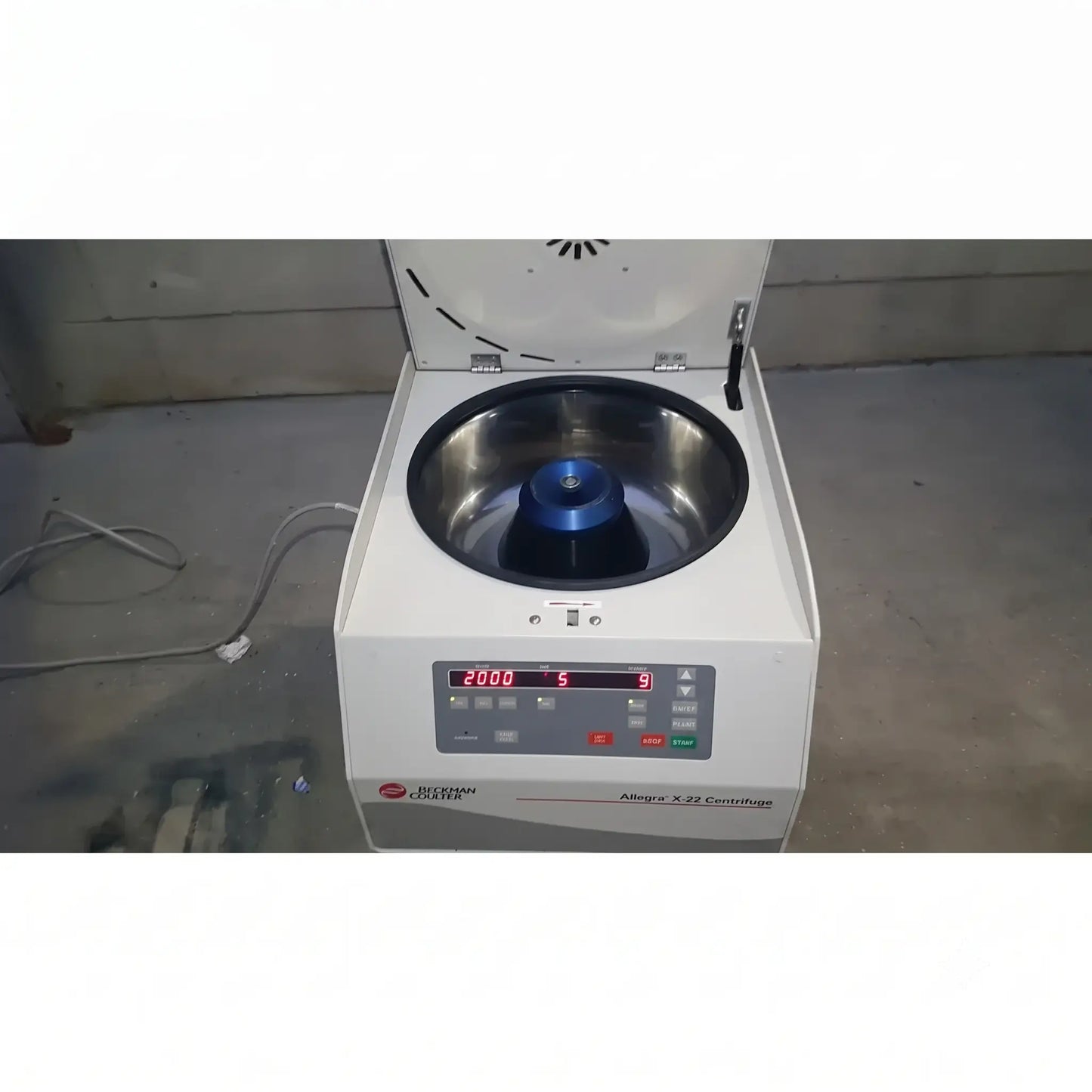 White Beckman Coulter Allegra X-22R benchtop centrifuge with digital display and stainless steel rotor chamber