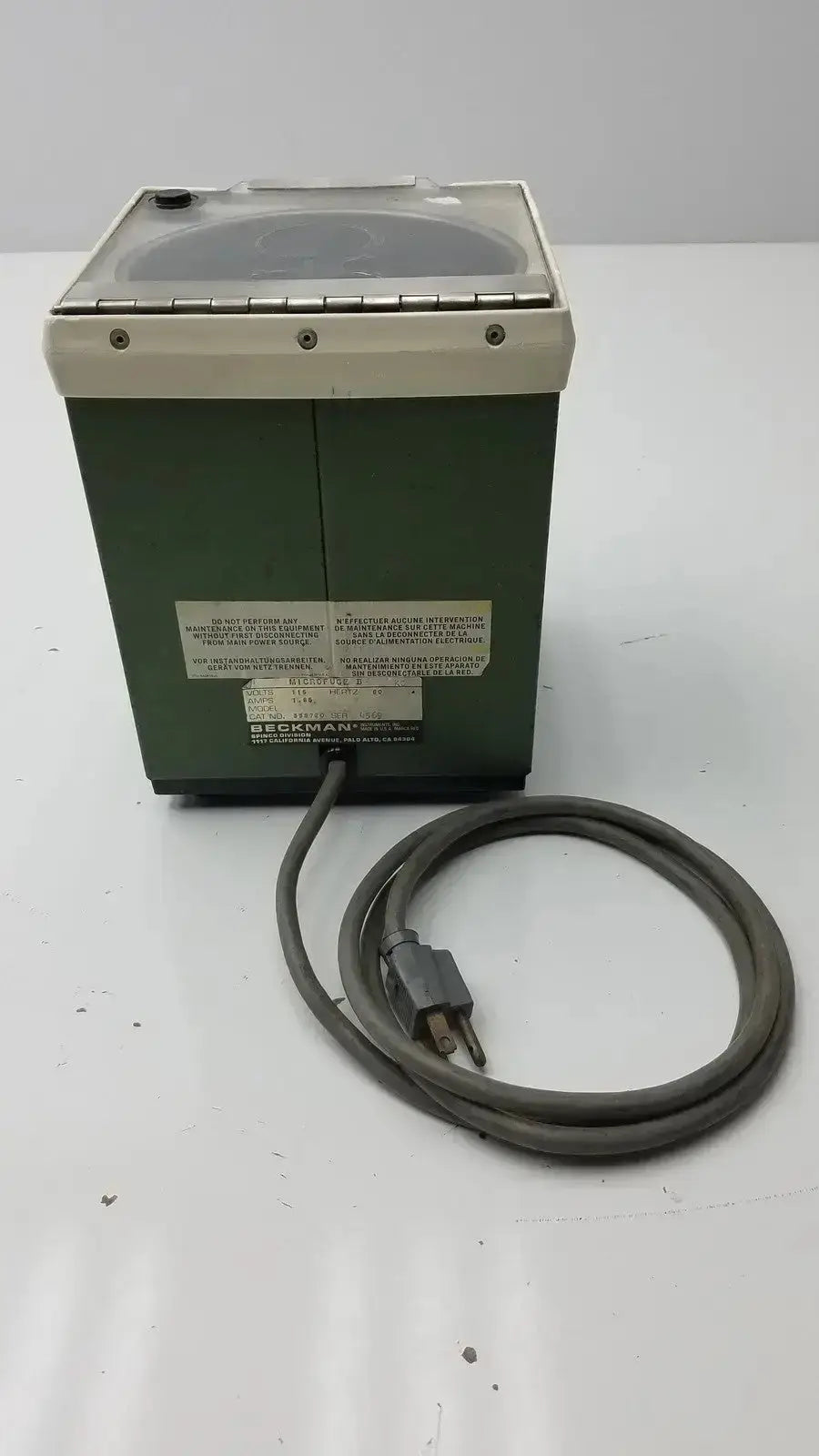 Green beckman model ultrasonic cleaner with clear lid and coiled gray cord for beckman microfuge b microcentrifuge