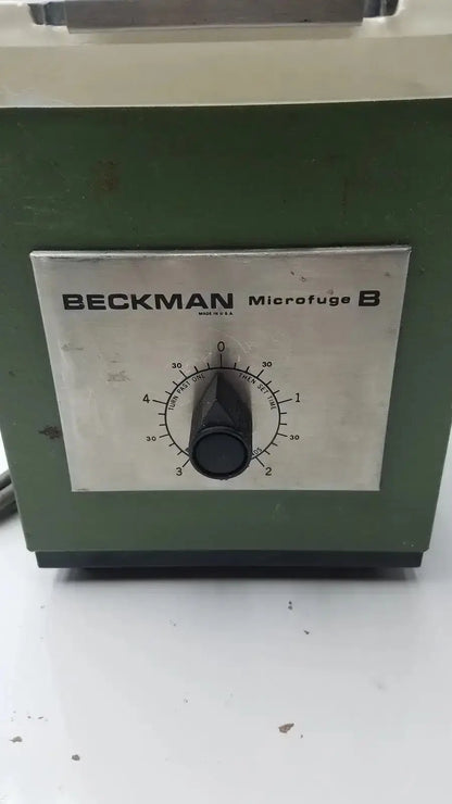 Beckman microfuge b microcentrifuge with green metal casing and silver control panel featuring black rotary dial used medical equipment for sale