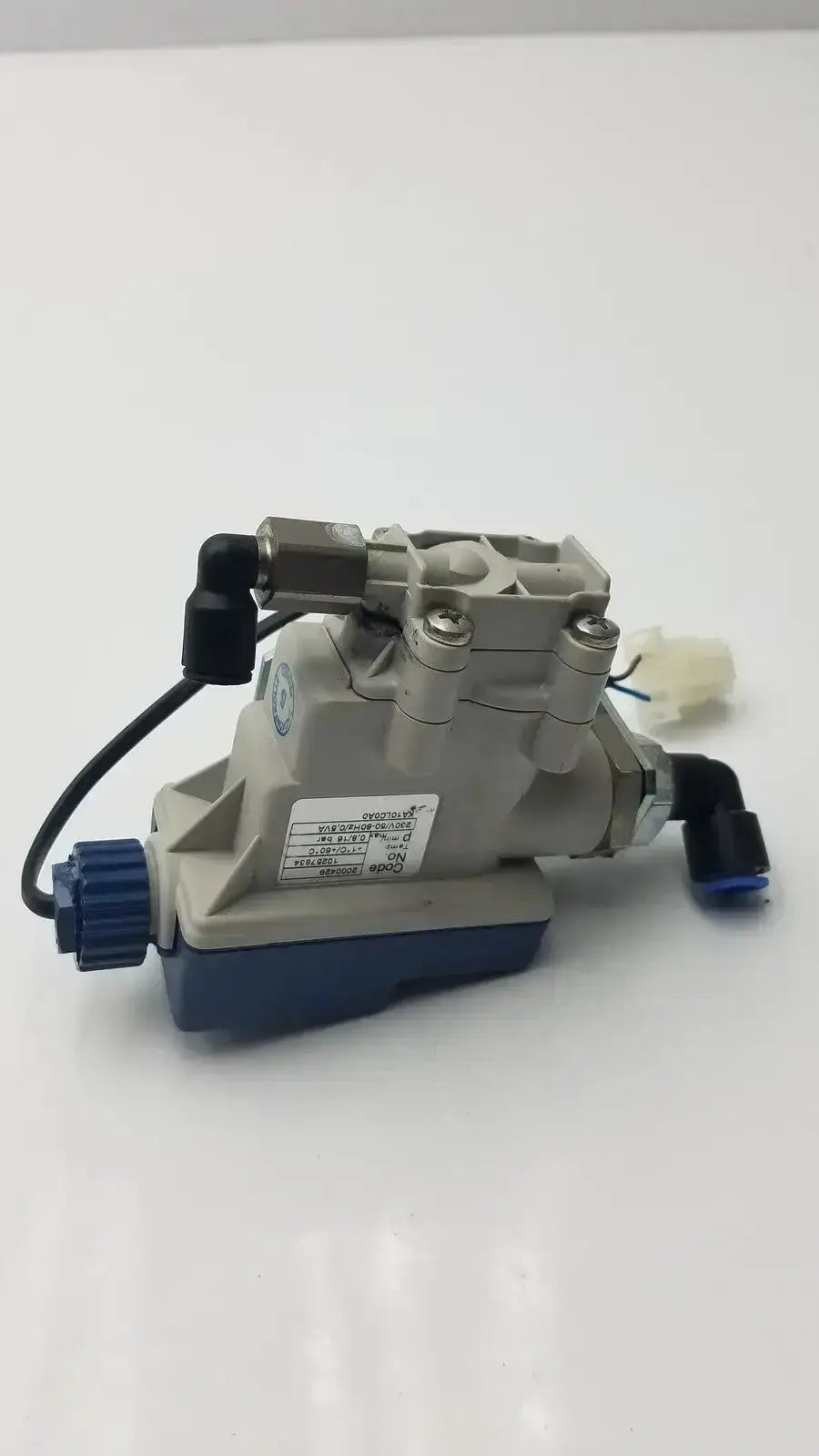 Gray and blue industrial hydraulic condensate controller KA10LC0A0 with black hoses and connectors for precise control
