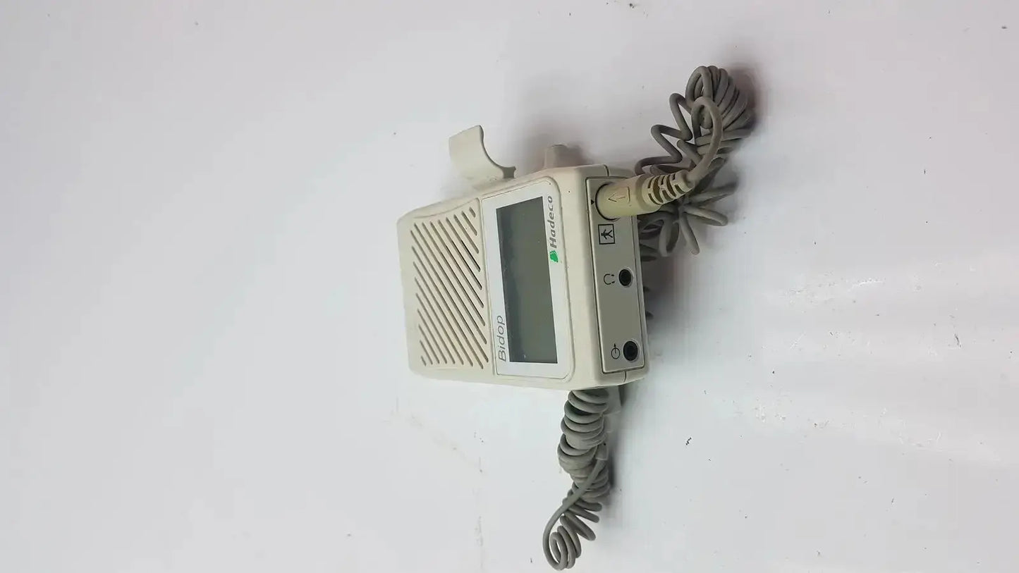 Beige becton dickinson es-100v3 bi-directional vascular doppler handheld unit with small screen and coiled gray cable