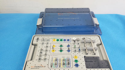 Bio horizons tapered internal dental implant surgical kit in blue and gray with organized compartments and colored tools