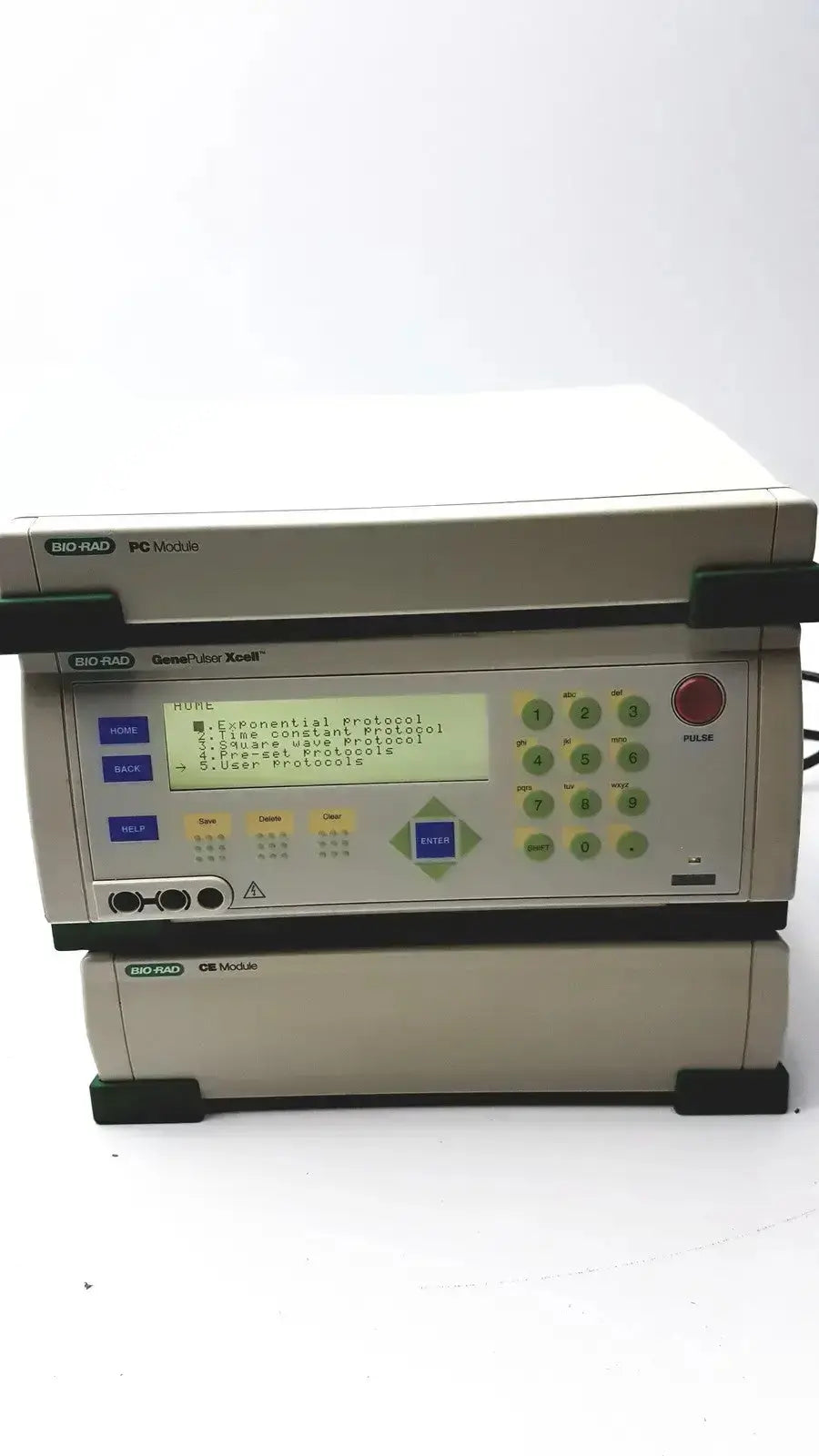 Beige and black rack-mounted test equipment with digital display and ports of bio-rad genepulser xcell electroporation system