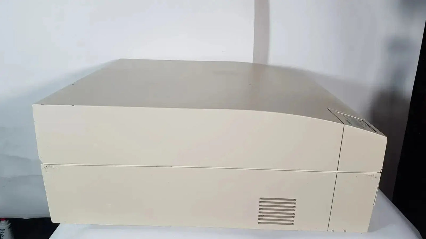 Beige plastic bio rad molecular imager fx desktop printer with rectangular design and vented side panel