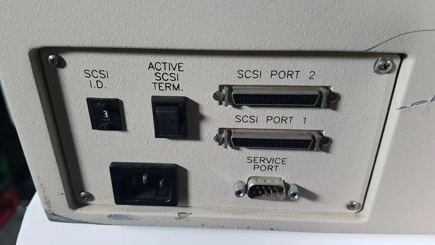 Beige computer chassis with black labeled ports and scsi id on the back of bio rad molecular imager fx device