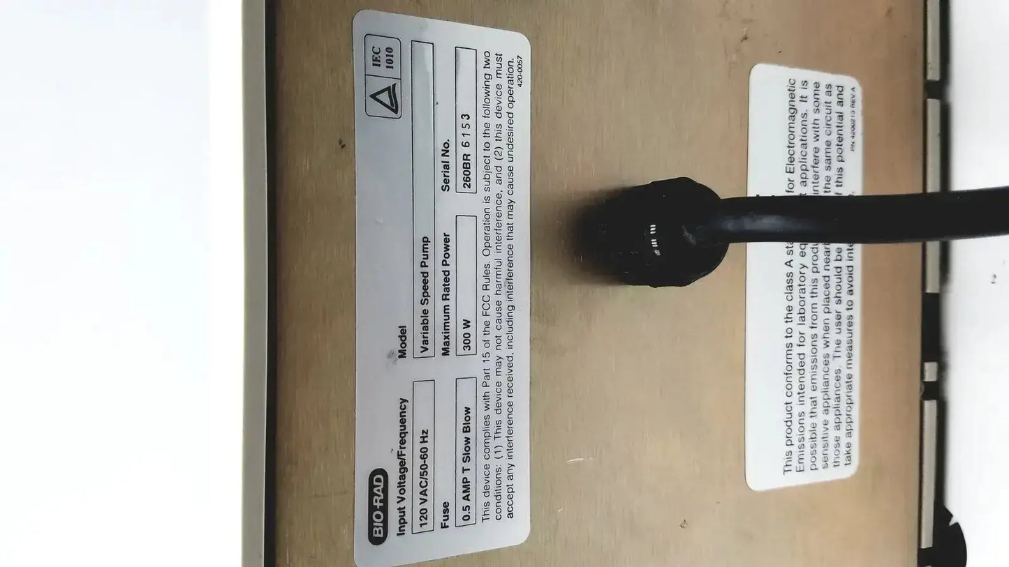 Black electrical plug with cord labeled bio-raid on the back of a bio-rad variable speed pump 260-br speed pump