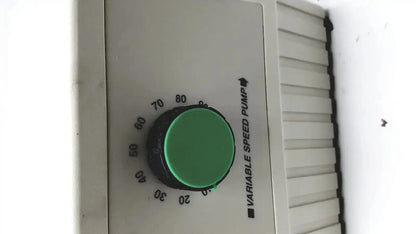Green circular dial on beige bio-rad variable speed pump 260-br control panel for precise speed pump adjustment