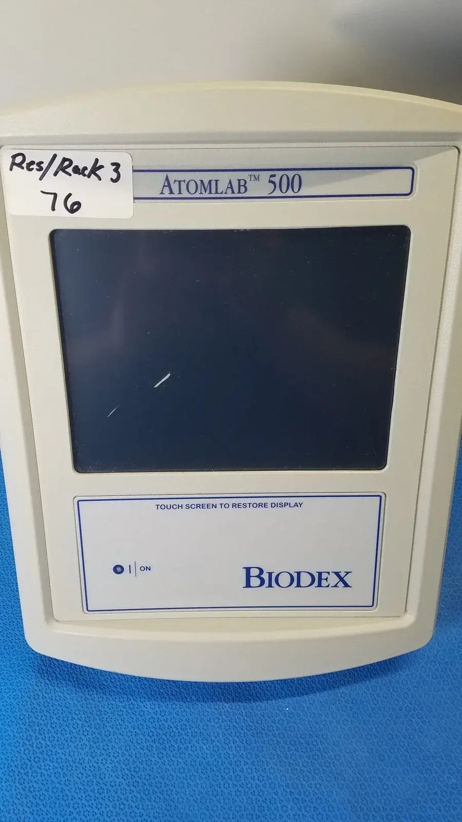 White plastic medical equipment Biodex 086-330 Atomlab 500 dose calibrator with dark touchscreen for reuse medical settings