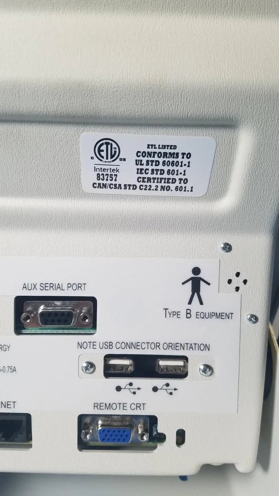 White plastic industrial monitor back panel with labeled ports on biodex 086-330 atomlab 500 dose calibrator for reuse medical equipment