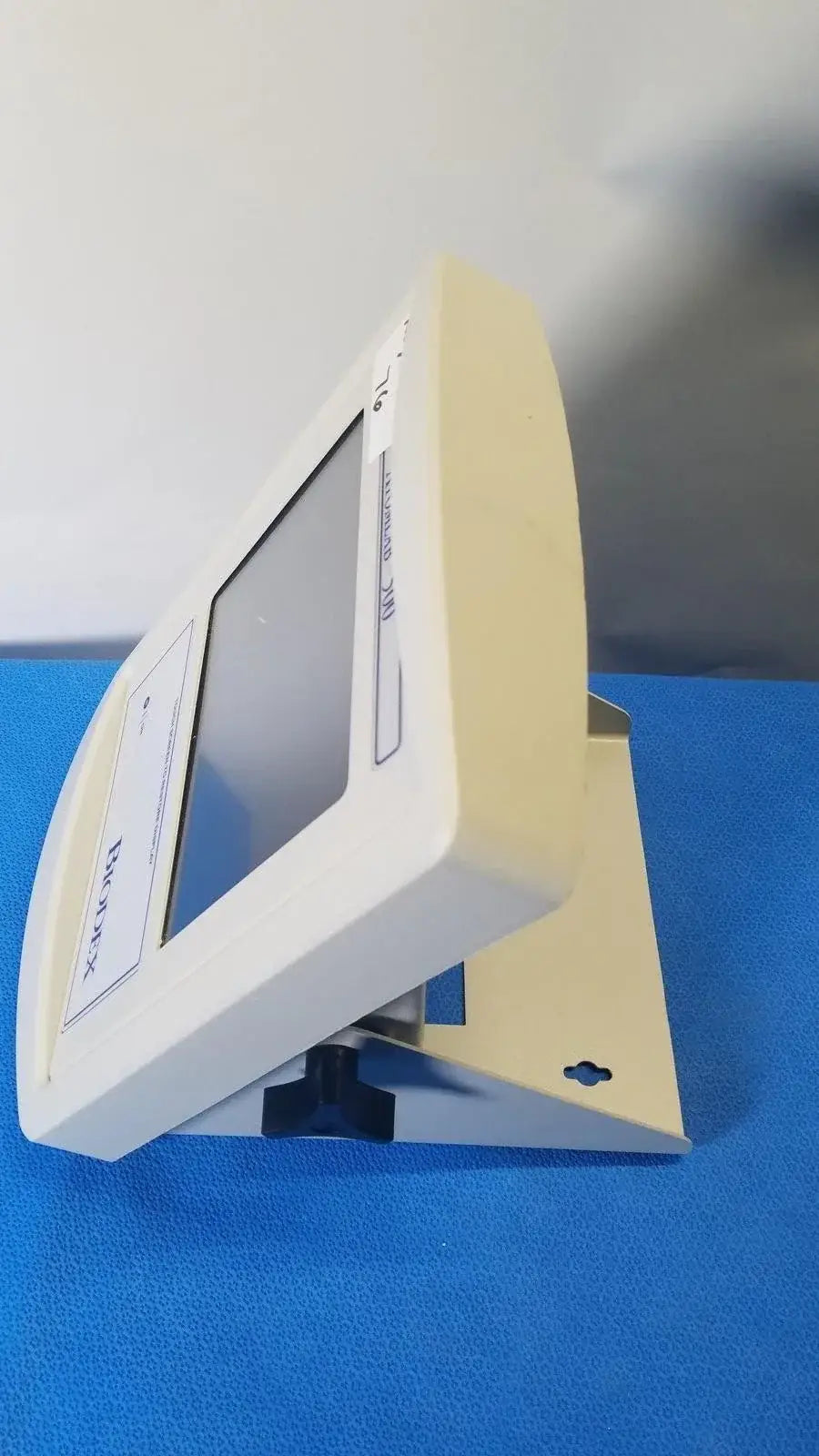 White plastic touchscreen terminal with black adjustment knob and bracket for Biodex 086-330 Atomlab 500 dose calibrator medical equipment