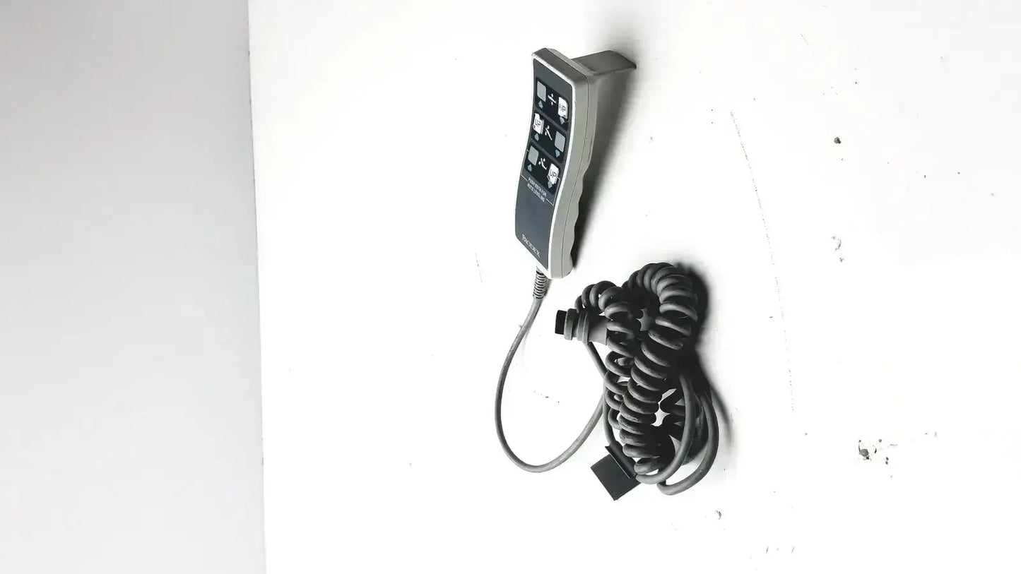 Gray handheld remote controller with coiled black cable for biodex ultrasound table remote use