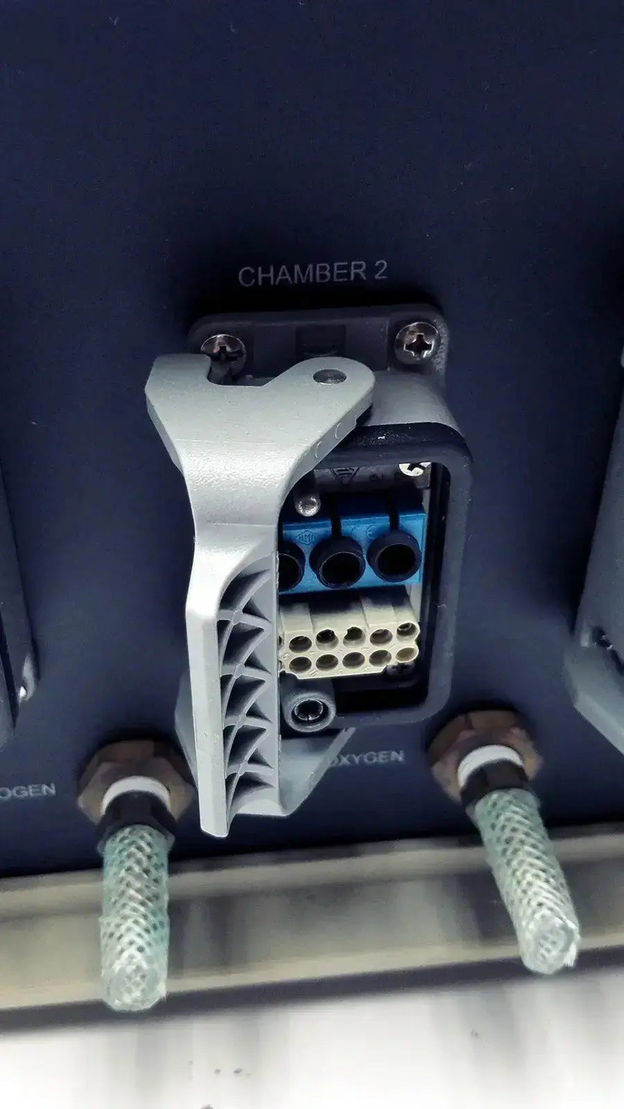 Gray plastic connector housing with blue and beige terminal blocks labeled chamber 2 on biospherix oxycycler a84xov dynamic controller