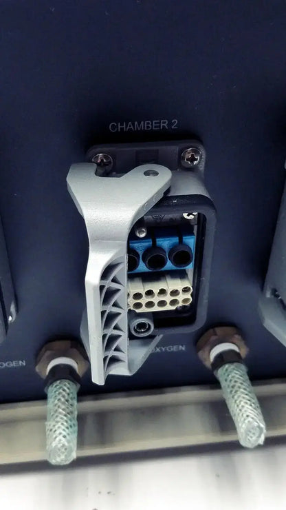 Gray plastic connector housing with blue and beige terminal blocks labeled chamber 2 on biospherix oxycycler a84xov dynamic controller