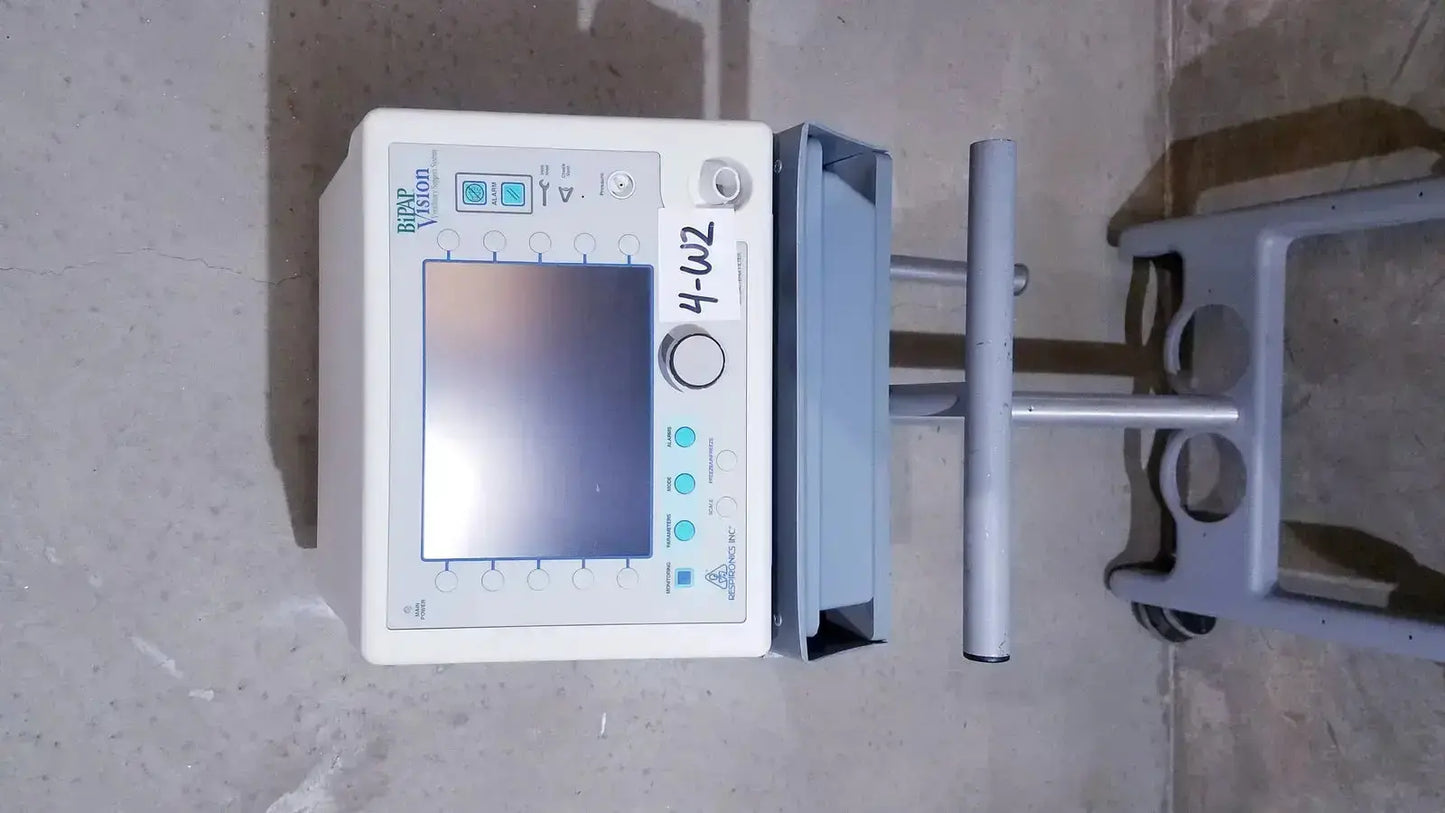 White rectangular bipap vision ventilatory support system monitor with screen and control buttons on front panel with stand