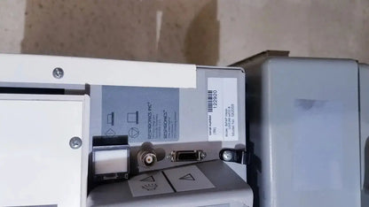 White industrial printer displaying model and serial number label of bipap vision ventilatory support system 582059 with stand