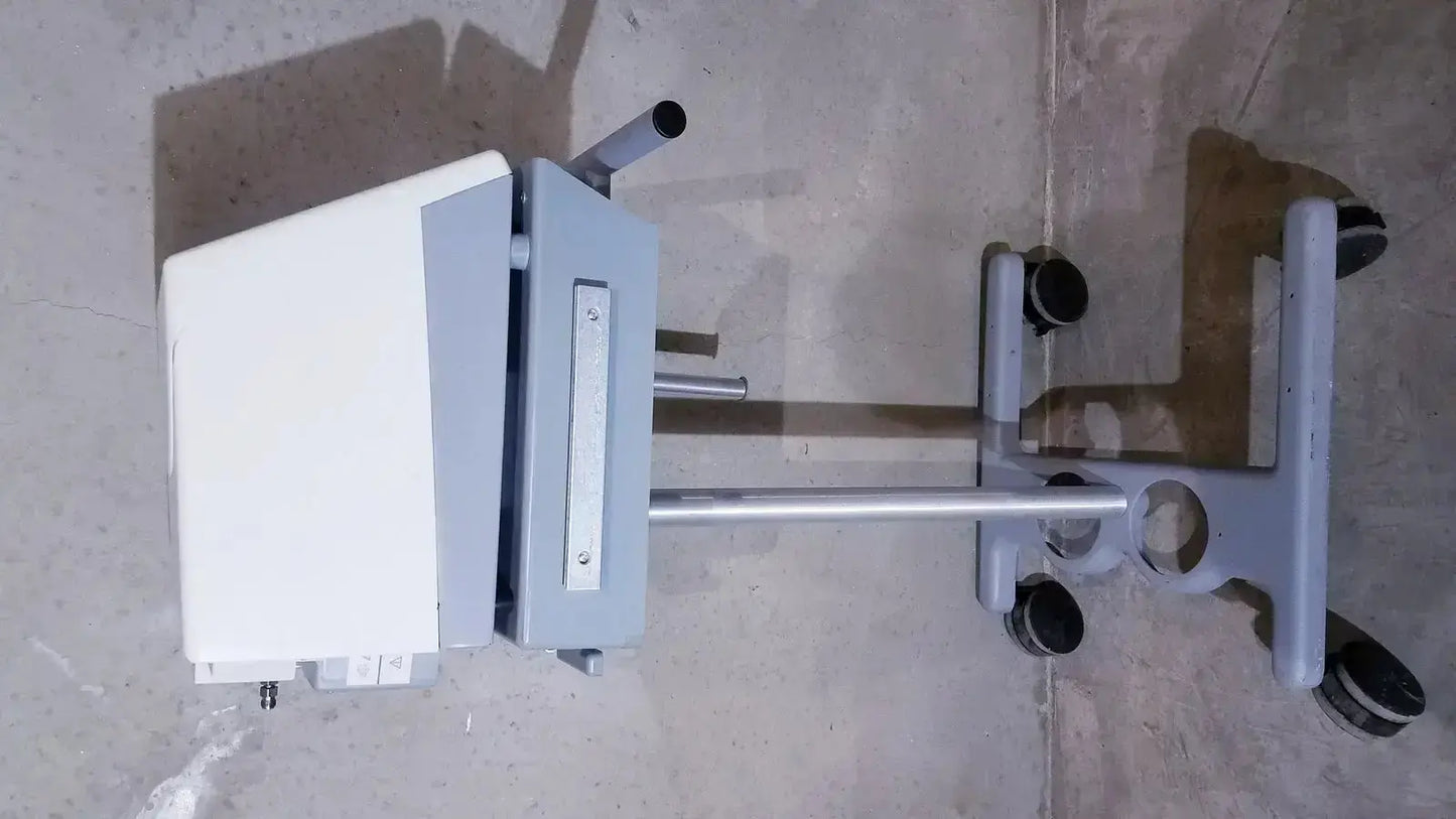 Gray medical cart with bipap vision ventilatory support system and four black-wheeled casters for mobility