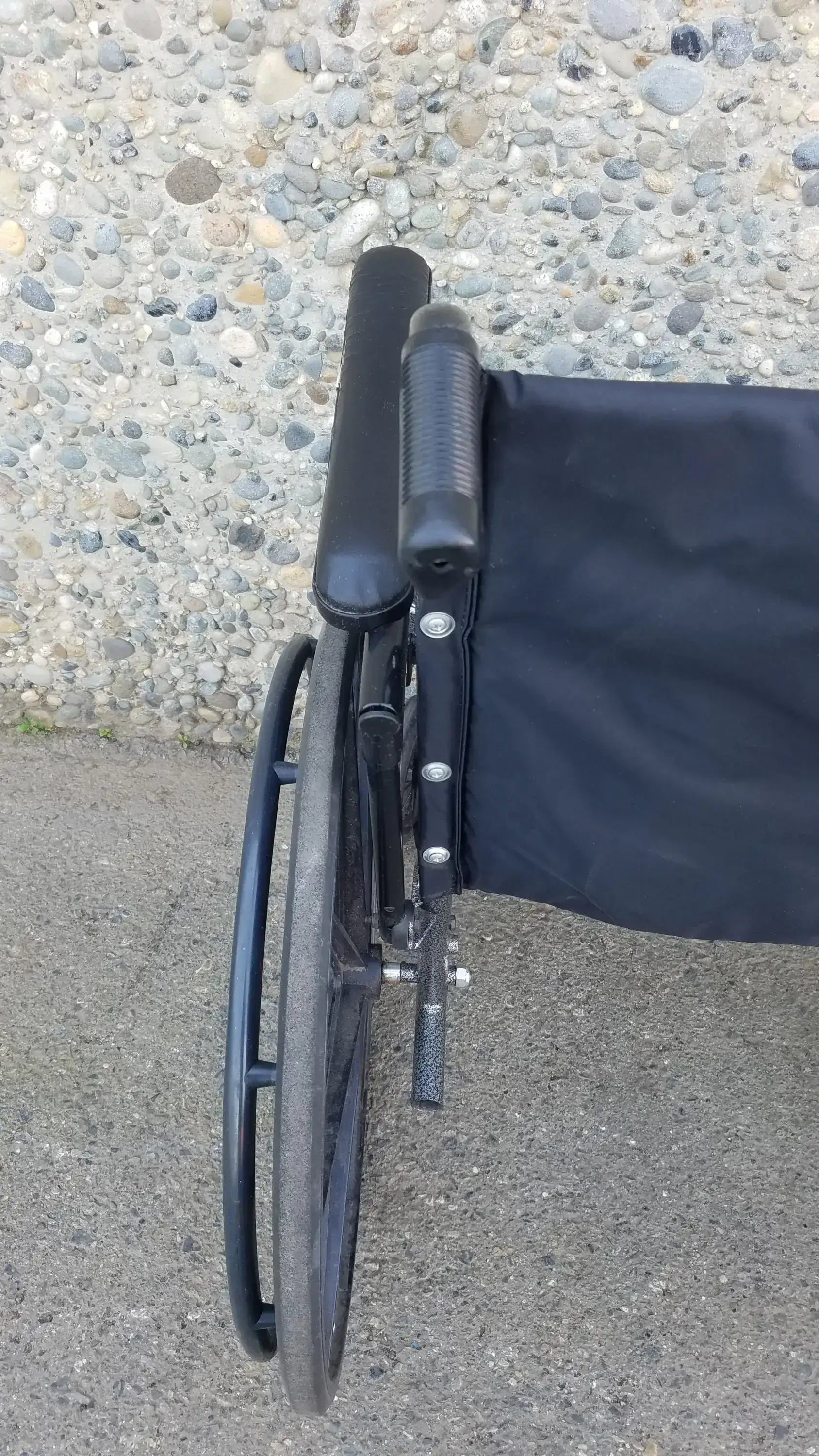 Black Invacare Tracer SX5 Wheelchair Featuring Sturdy Arm Rests