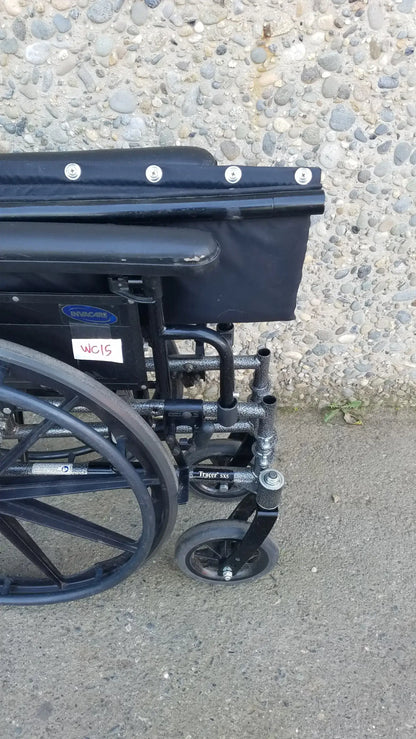 Black Invacare Tracer SX5 Wheelchair Featuring Sturdy Arm Rests