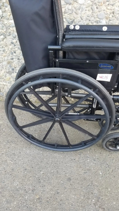 Black Invacare Tracer SX5 Wheelchair Featuring Sturdy Arm Rests