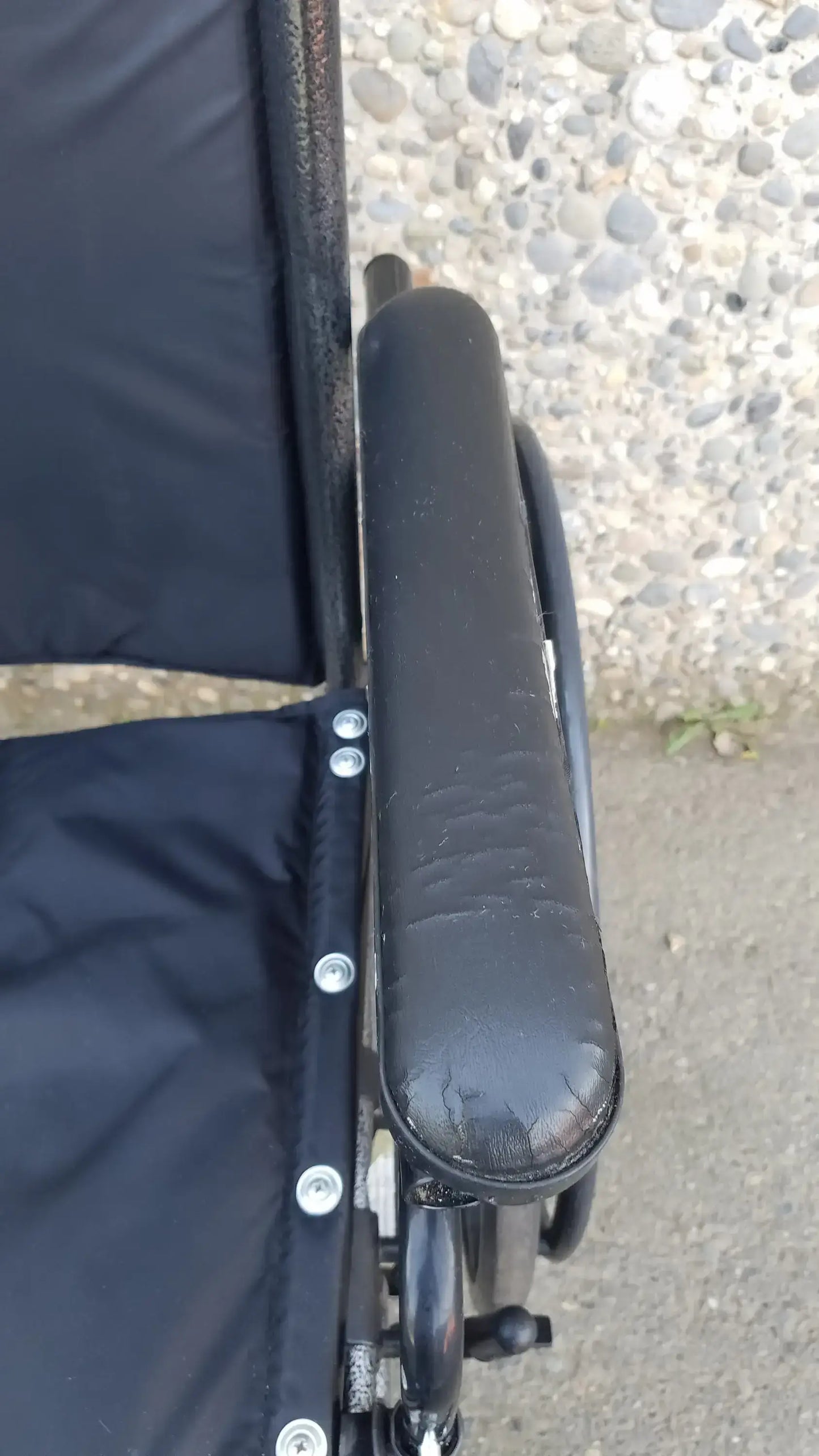 Black Invacare Tracer SX5 Wheelchair Featuring Sturdy Arm Rests