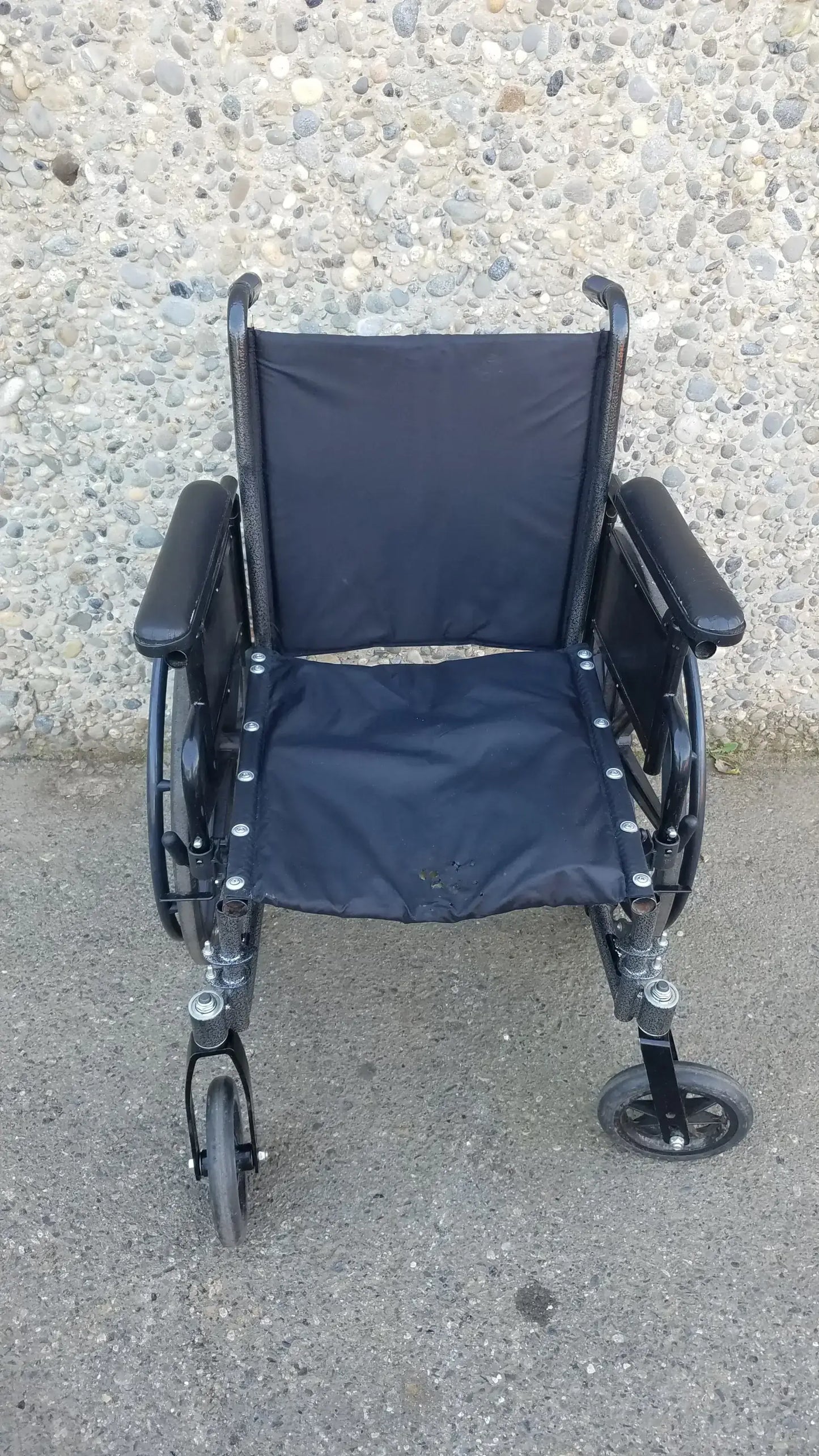 Black Invacare Tracer SX5 Wheelchair Featuring Sturdy Arm Rests