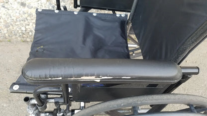 Black Invacare Tracer SX5 Wheelchair Featuring Sturdy Arm Rests