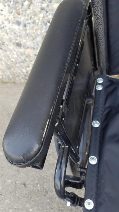Black Invacare Tracer SX5 Wheelchair Featuring Sturdy Arm Rests