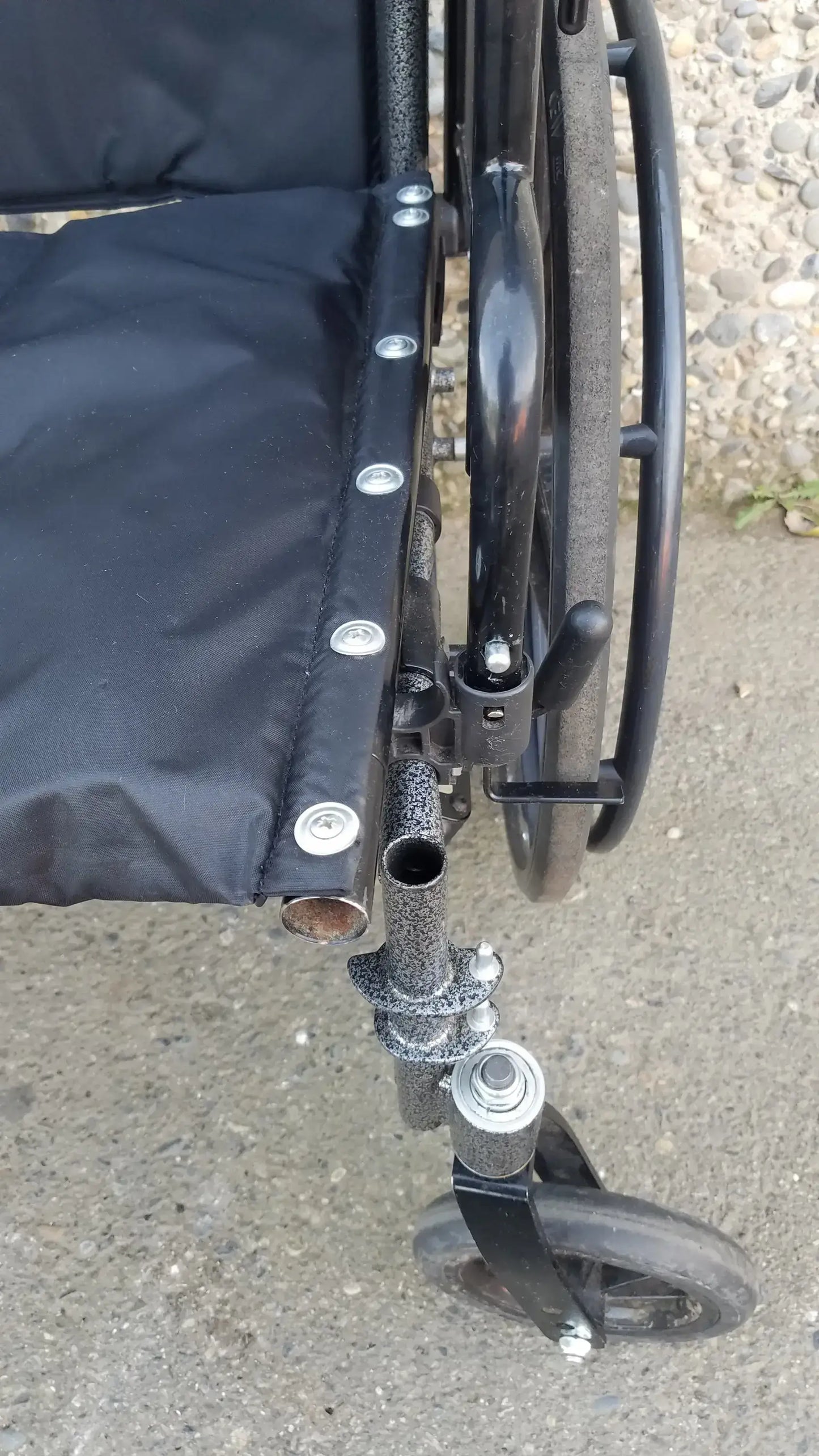 Black Invacare Tracer SX5 Wheelchair Featuring Sturdy Arm Rests