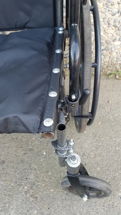 Black Invacare Tracer SX5 Wheelchair Featuring Sturdy Arm Rests
