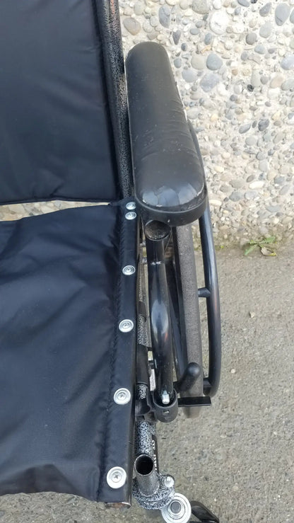 Black Invacare Tracer SX5 Wheelchair Featuring Sturdy Arm Rests