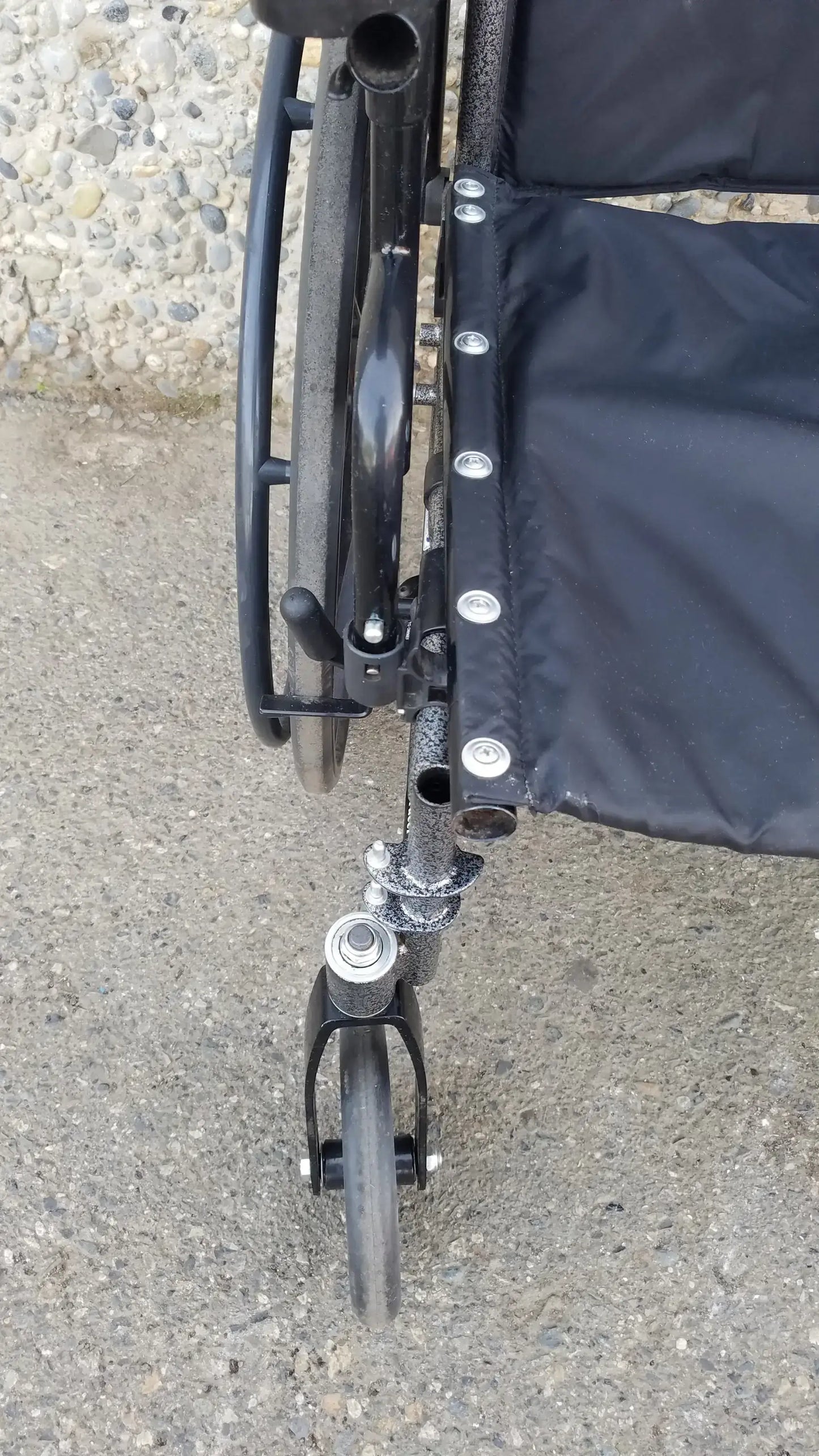 Black Invacare Tracer SX5 Wheelchair Featuring Sturdy Arm Rests