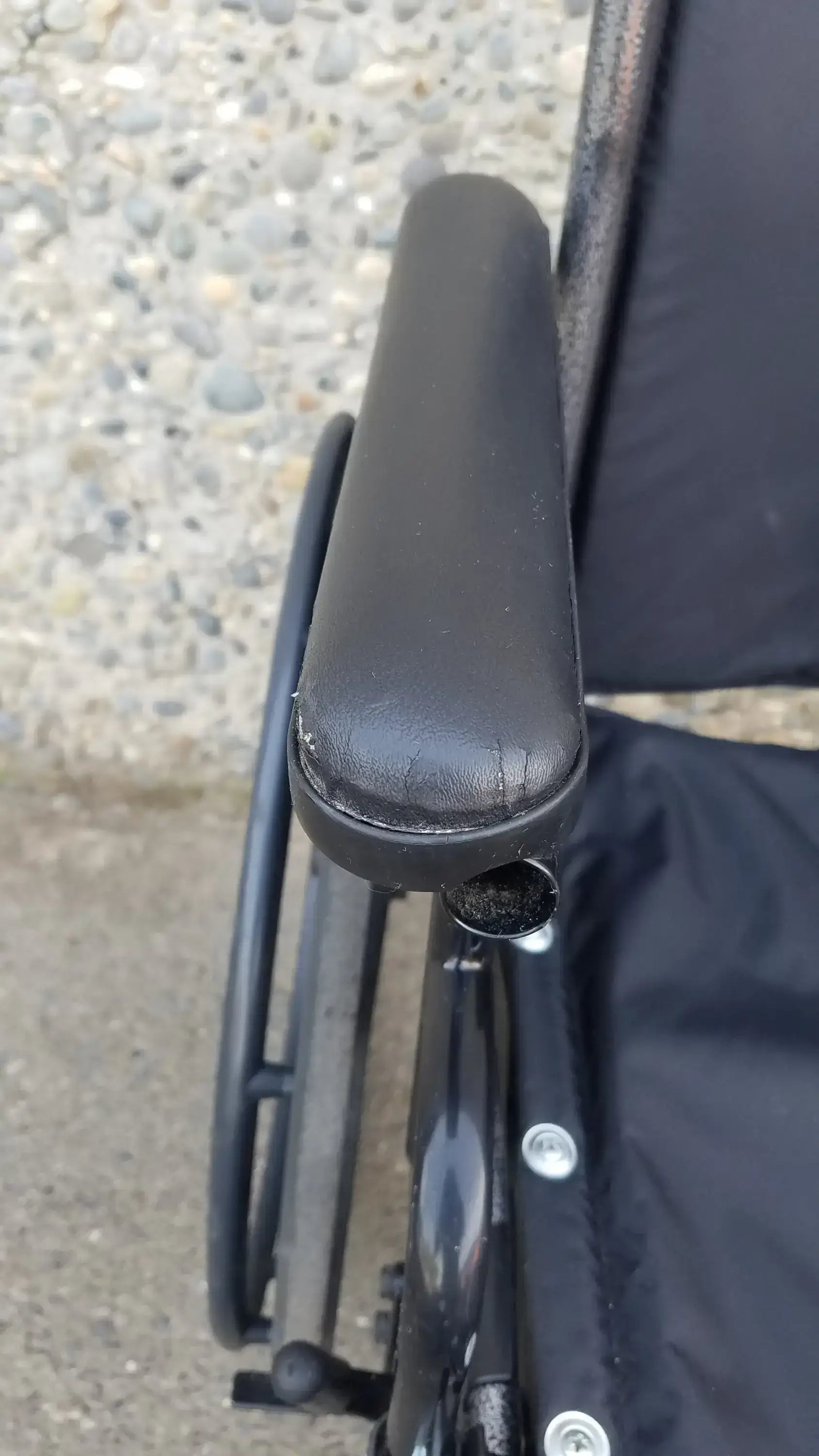Black Invacare Tracer SX5 Wheelchair Featuring Sturdy Arm Rests