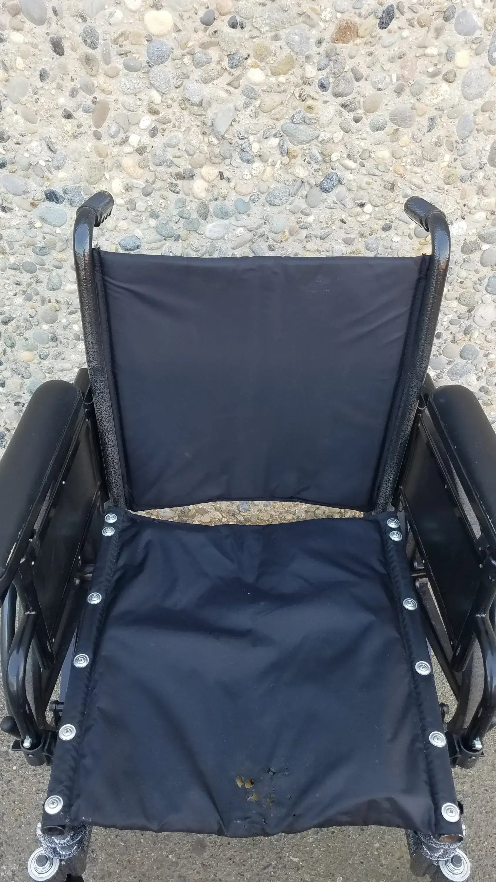 Black Invacare Tracer SX5 Wheelchair Featuring Sturdy Arm Rests