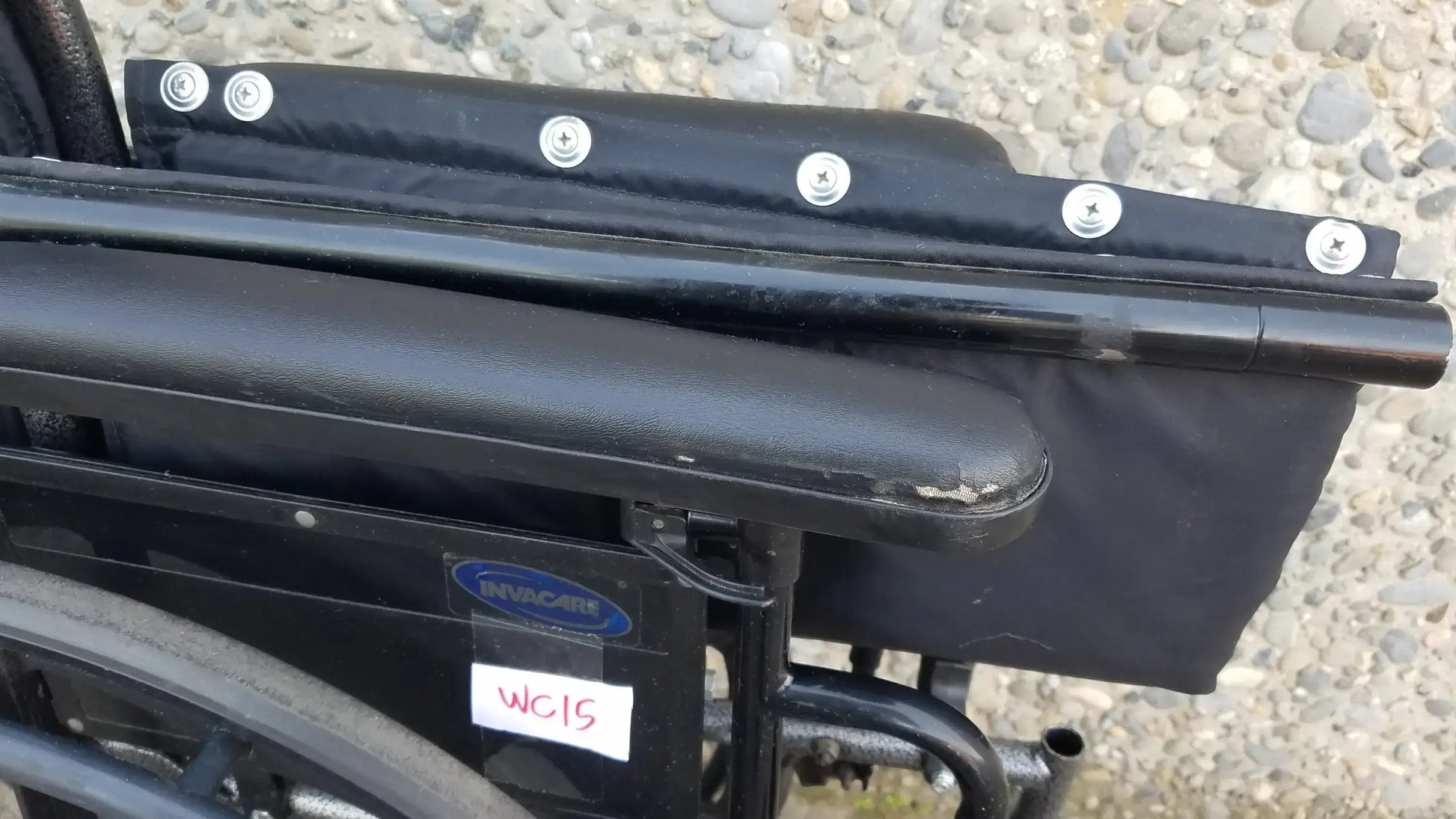 Black Invacare Tracer SX5 Wheelchair Featuring Sturdy Arm Rests